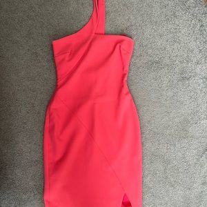 Likely one shoulder coral dress. Hits above the knee on someone 5”2.